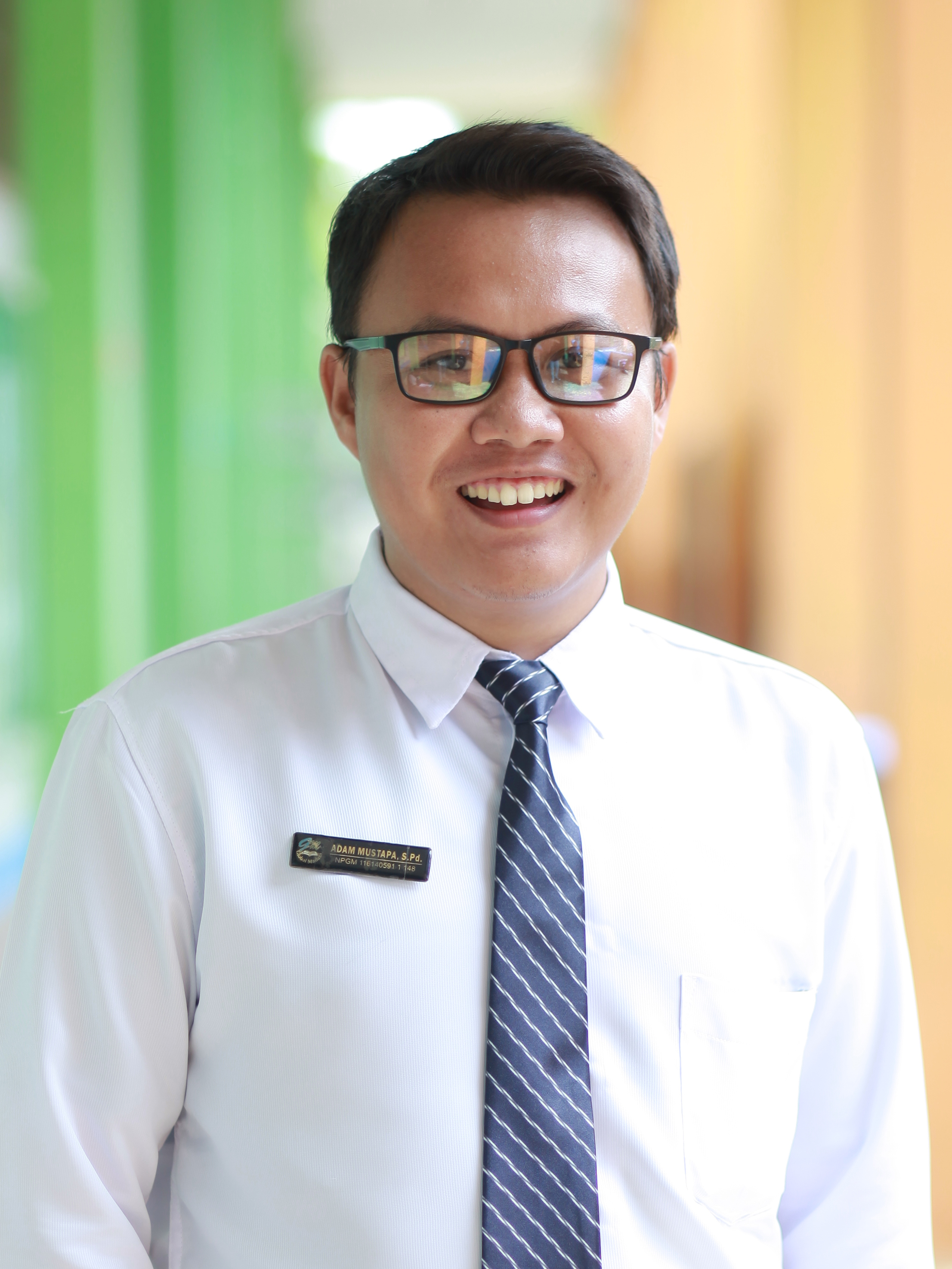 Adam Mustapa, S.Pd.