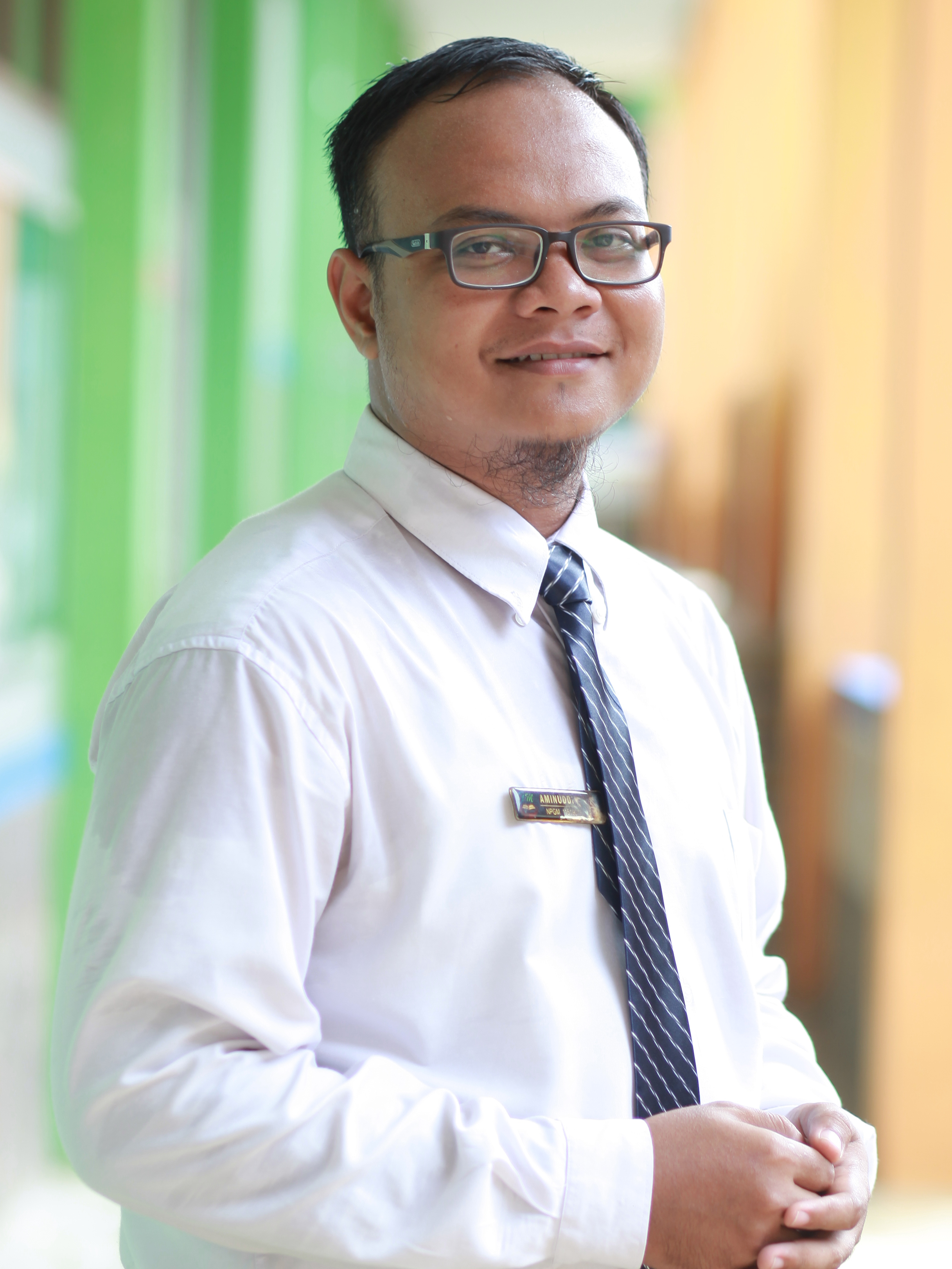 Aminuddin, S.Psi.