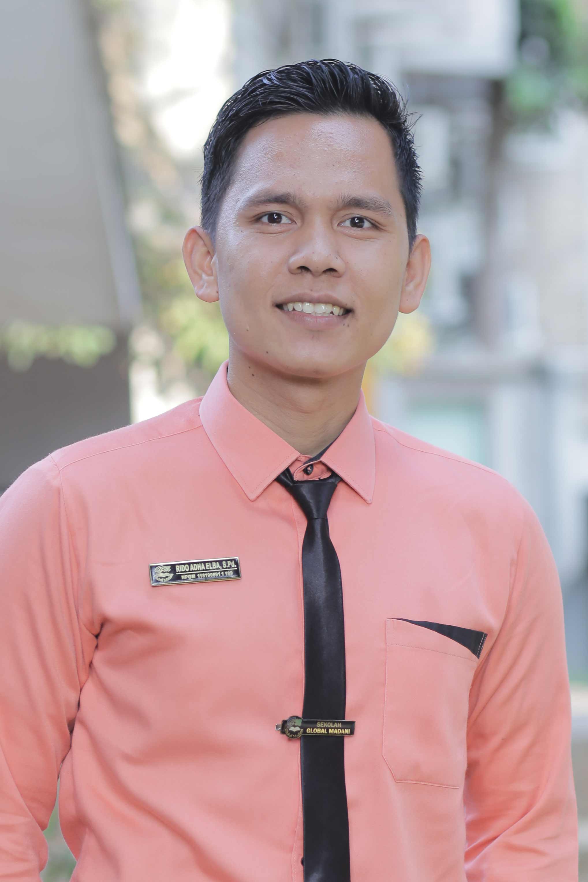 Rido Adha Elba, S.Pd.