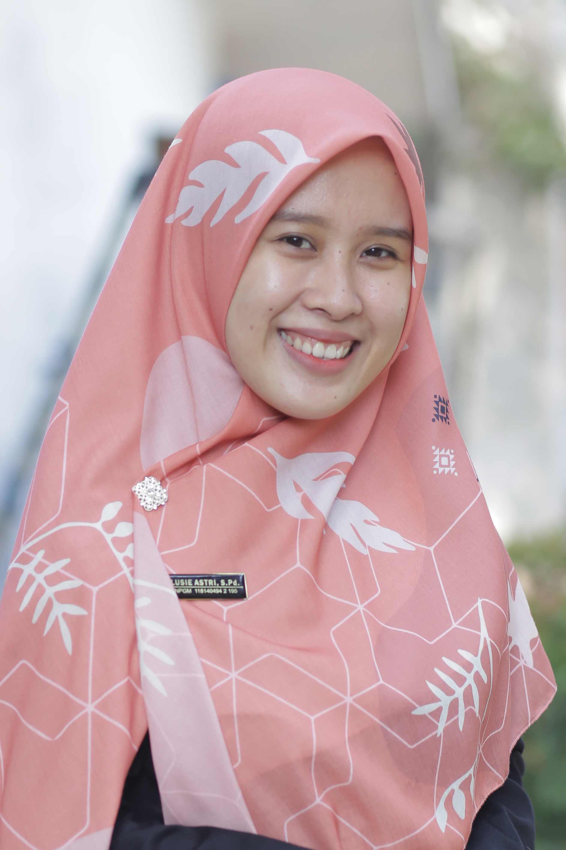 Lusie Astri, S.Pd.
